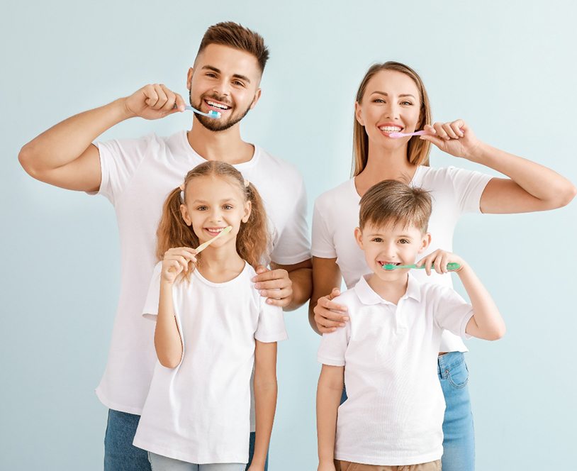 Smiling family after their dental checkup and cleaning in Derby