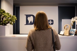 Woman checking-in at dentist