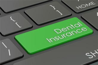 Green dental insurance button on keyboard