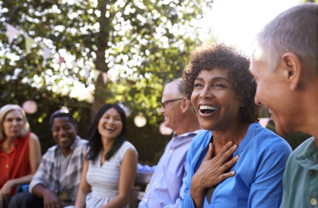 Friends outdoors smiling together