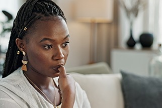Closeup of woman biting her nails
