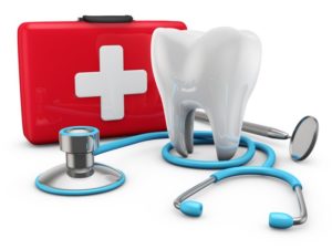 a digital image of a tooth in front of a dental emergency kit